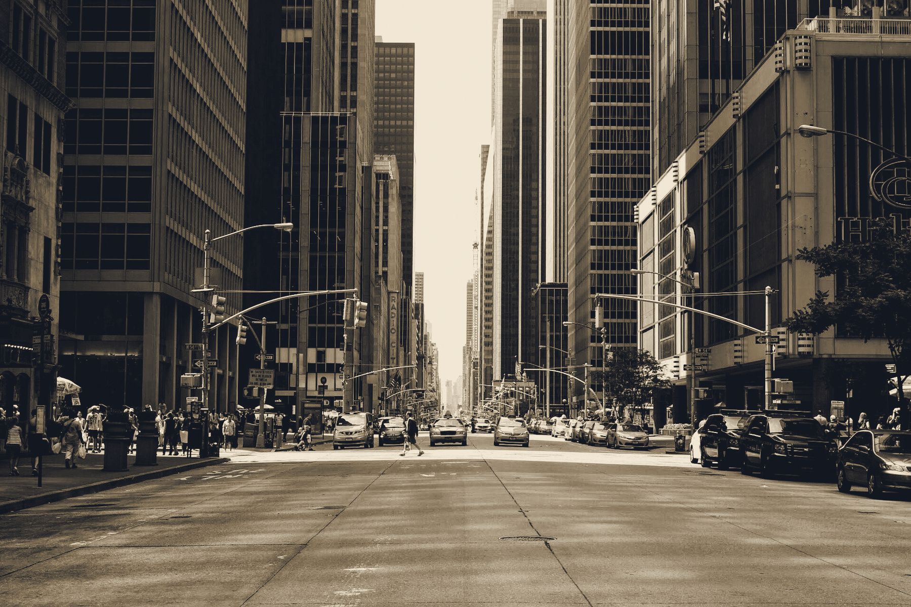 City avenue lined with buildings, seen down the centerline
